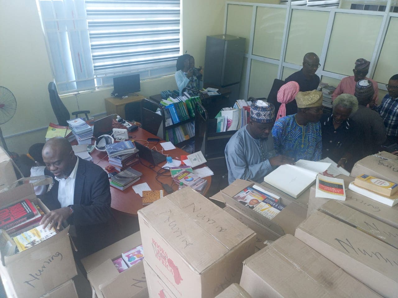 Boxes of medical books being packed